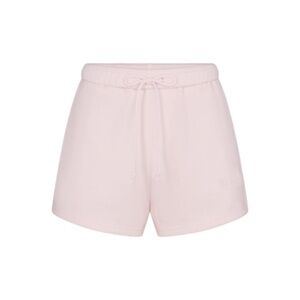 skims cotton fleece classic shorts in barely pink